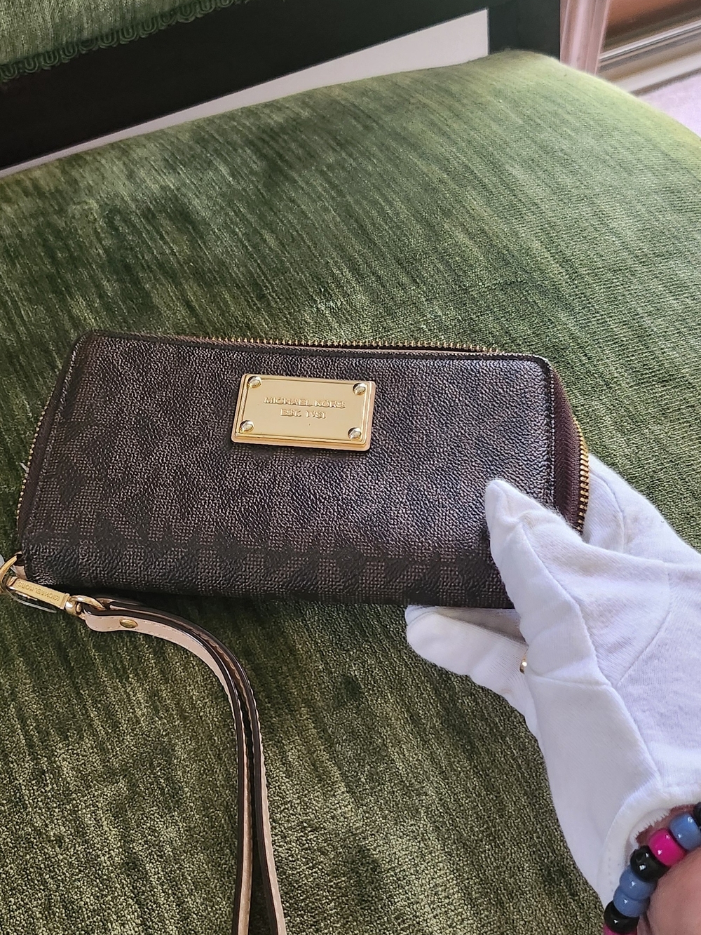 Michael Kors Brown Logo Zip-Around Wristlet with Gold Plate